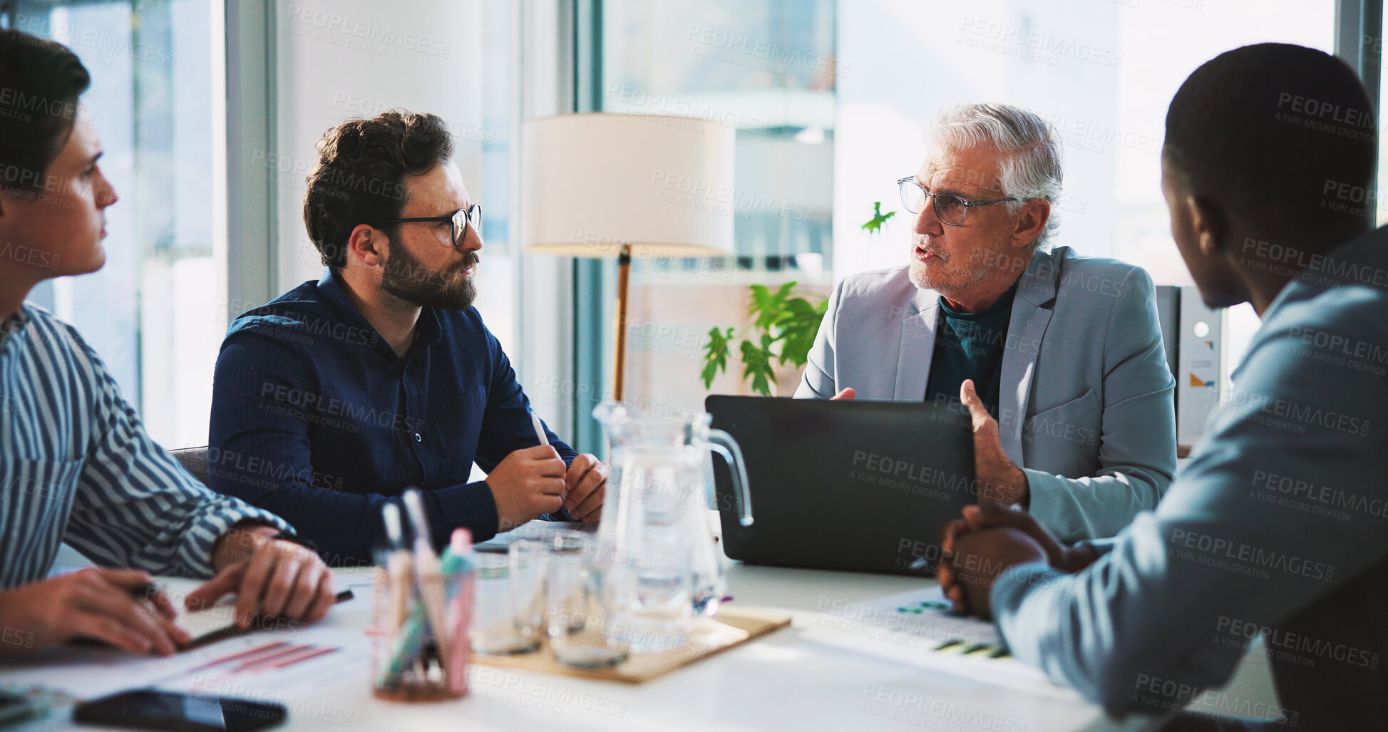 Buy stock photo Boardroom, laptop and management with business people at table together for coaching or training. Computer, conversation and meeting with mentor teaching employee team in workplace for development