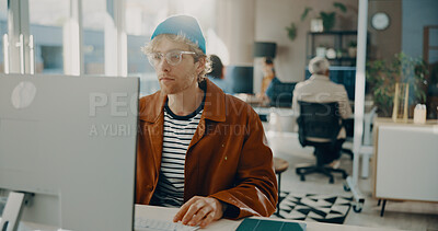 Buy stock photo Reading, computer or business man in agency for software development, online project or review. Desktop, serious or frontend developer with internet update, creative problem solving or website design