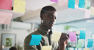 Buy stock photo Writing, brainstorming and person in office with sticky note, ideas or solution for project management. Planning, mindmap or black man in workplace with problem solving, business insight or strategy