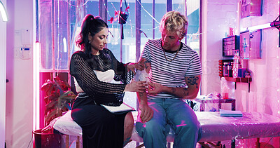 Buy stock photo Tattoo, stencil and client with artist in store for body art design, neon studio and culture. Permit ink aesthetic, customer and artwork with people in parlour for creative, process and identity