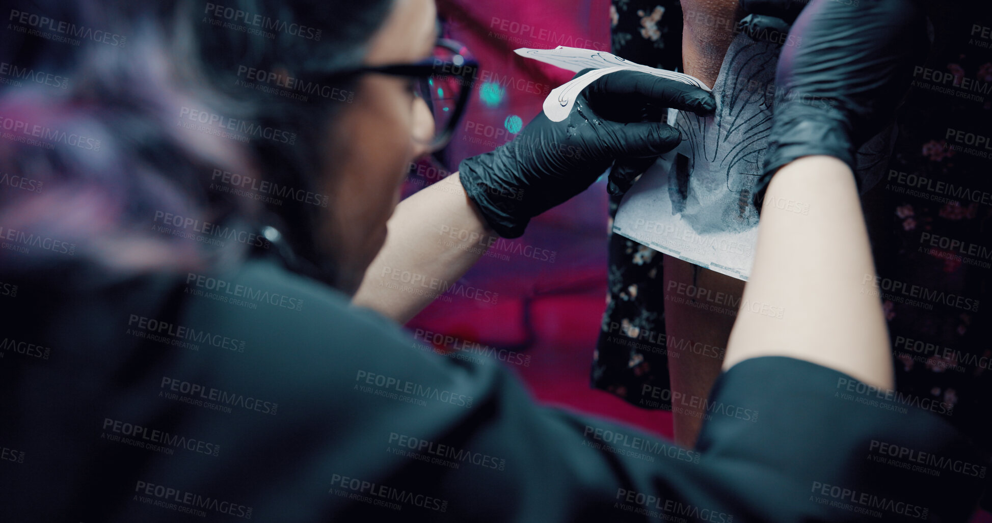 Buy stock photo Tattoo, stencil and hands with artist in store for body art design, studio and culture. Permanent ink aesthetic, customer and artwork with people and tracing for creative, process or identity
