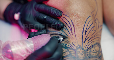 Buy stock photo Tattoo artist, hands and machine with leg of client in store for body art design, neon studio and culture. Permanent ink aesthetic, customer and artwork with people for creative, process and identity