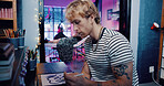 Tablet, tattoo artist and drawing with man in studio for artwork design preview, aesthetic and body art culture. Permanent ink, customer and creative process with person in parlor for digital sketch