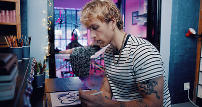 Buy stock photo Tablet, tattoo artist and drawing with man in studio for artwork design preview, aesthetic and body art culture. Permanent ink, customer and creative process with person in parlor for digital sketch