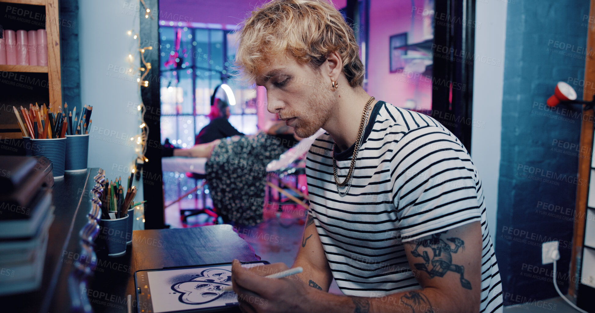 Buy stock photo Tablet, tattoo artist and drawing with man in studio for artwork design preview, aesthetic and body art culture. Permanent ink, customer and creative process with person in parlor for digital sketch