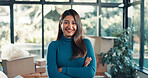 Portrait, smile and woman in new home with arms crossed for moving, real estate or ownership. Landlord, confidence or dream house for relocation, property mortgage or homeowner with investment in UAE
