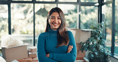 Buy stock photo Portrait, smile and woman in new home with arms crossed for moving, real estate or ownership. Landlord, confidence or dream house for relocation, property mortgage or homeowner with investment in UAE
