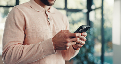 Buy stock photo Phone, hands and man in home with networking, communication or chatting on mobile app. Technology, typing and male person with cellphone for email, texting and social media online in apartment.