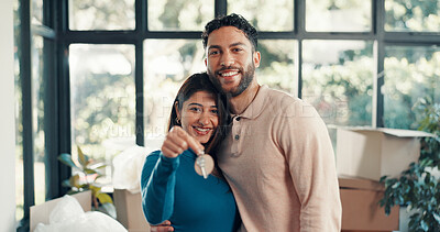 Buy stock photo Keys, portrait and moving with couple in new home for property investment, love and partner. Hug, real estate growth and homeowner purchase with man and woman in house for relocation and rent