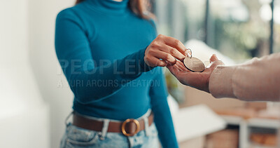 Buy stock photo Hands, giving keys and new home with real estate, deal and property sale for relocation, moving or fresh start. People, realtor or agent with client, homeowner and agreement for purchase at apartment