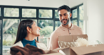 Buy stock photo Couple, boxes and real estate with smile, home owner and achievement with property investment. Rental apartment, woman and man in lounge, relocation and mortgage with new house, support and moving in