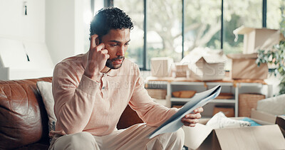 Buy stock photo Moving, man or stress with documents in home for eviction notice, lease violation or finance crisis. Relocation, person or worry with paperwork on sofa for hidden foreclosure clause and rent pressure