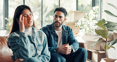 Buy stock photo Couple, living room and argument with moving, stress and drama in home or apartment. Headache, woman and man with dispute, angry and fight with relocation and anxiety or crisis with toxic partner