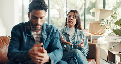 Buy stock photo Couple, living room and conflict with moving, stress and drama in home or apartment. Frustrated, woman and man with dispute, angry and fight with relocation and anxiety or crisis with toxic partner