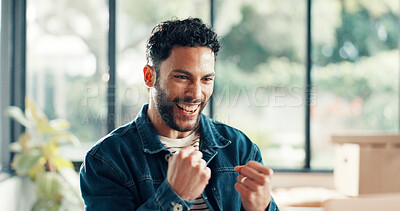 Buy stock photo Happy, man or winning in home office at startup with laugh, development and excited for good news. Smile, entrepreneur and small business owner with fist pump for sales profit, growth and success.