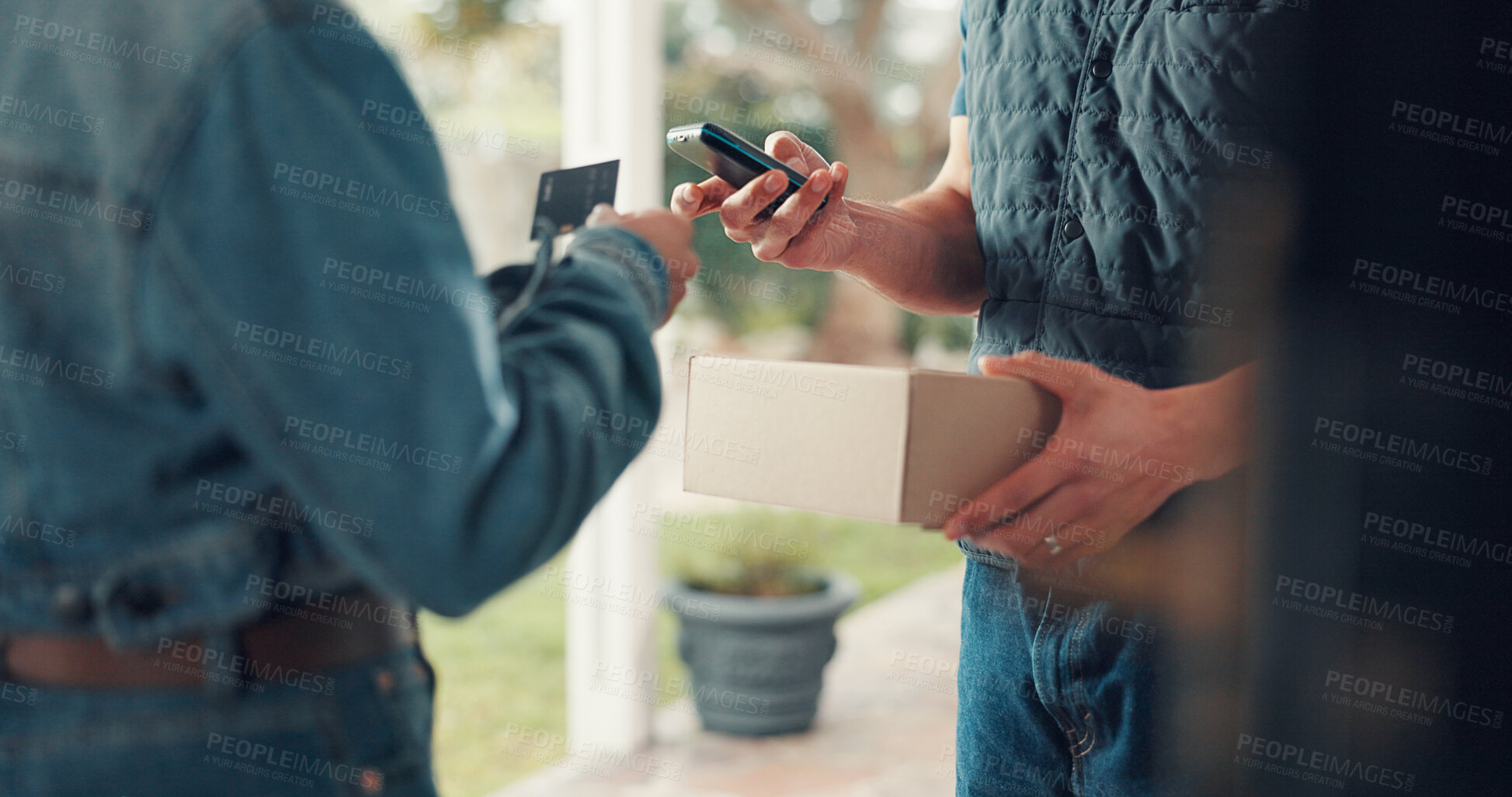 Buy stock photo Hands, courier and credit card at front door with payment, box and easy transaction at apartment. People, delivery and pos with fintech, shipping service or cardboard package for ecommerce at house