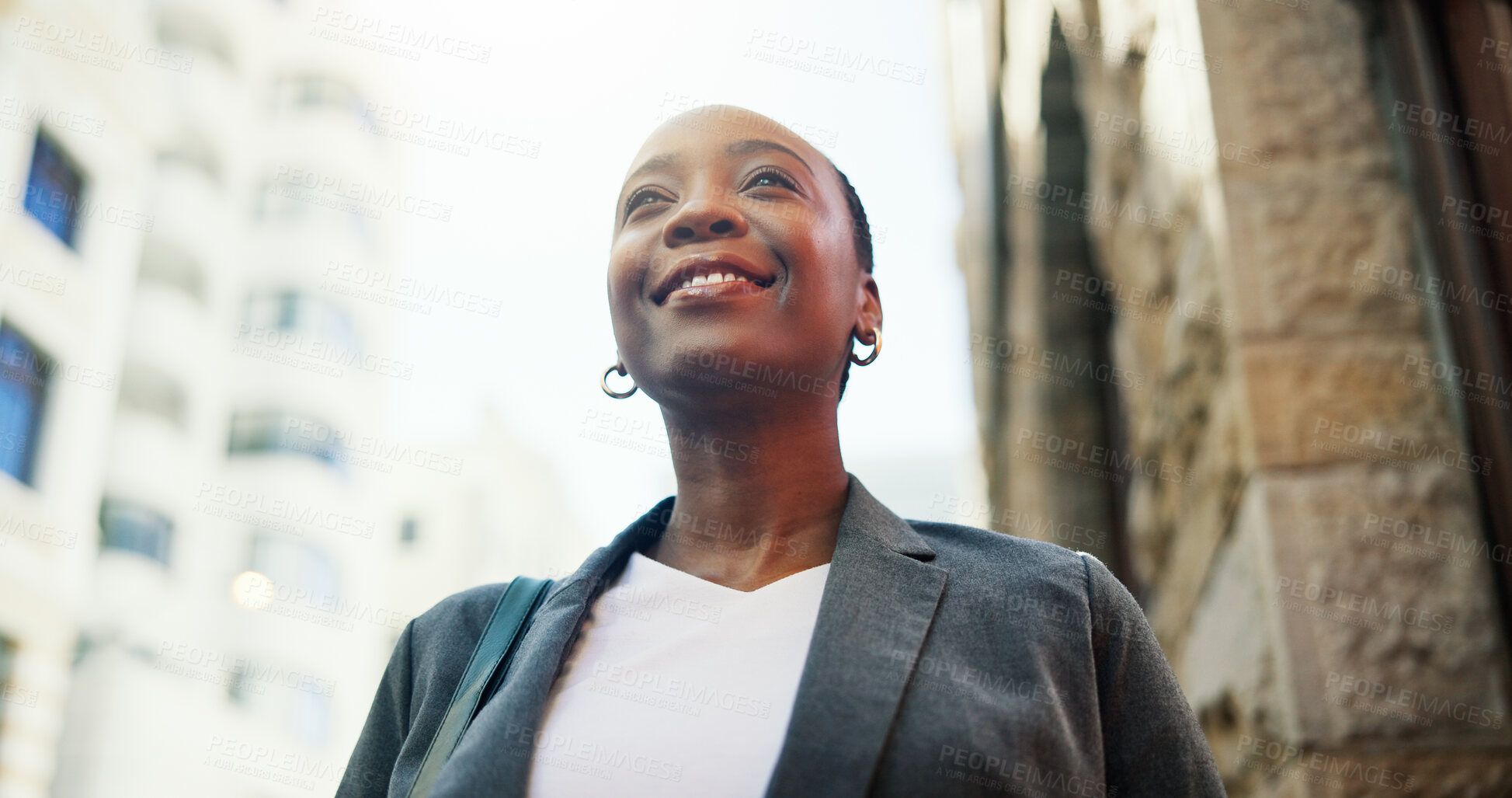 Buy stock photo Black woman, realtor and city with vision for corporate settlement or property investment below. Female person, smile or real estate agent with ambition, dream or sight for urban development downtown