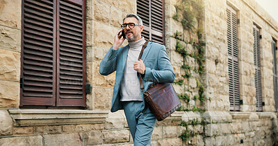 Buy stock photo Businessman, lawyer and walking with phone in city for conversation, proposal or outdoor chat. Man, attorney or talking with mobile smartphone for business discussion or negotiation in an urban town