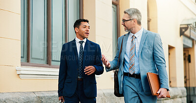 Buy stock photo Business, lawyers and men in city, conversation and feedback for legal case, mentor and talking. Outdoor, people and attorneys in street, discussion or advice for justice procedure or hearing process