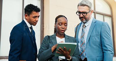 Buy stock photo Discussion, team and people in city with tablet, feedback or planning for report. Group, collaboration and marketing analyst in urban area with tech, collective goal and research for consumer growth.