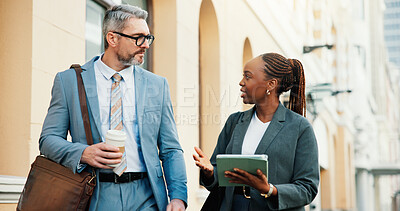 Buy stock photo Lawyers, people and tablet in city with conversation for court, litigation or judicial policy online. Review case notes, team or mature man and woman outdoor with coffee, tech and legal hearing prep