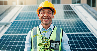 Buy stock photo Solar panel, happy man and portrait of engineer with plant on roof in city for clean energy. Photovoltaic electricity, smile and technician with renewable power, environment and eco friendly leaves
