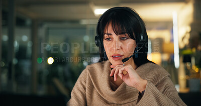 Buy stock photo Woman, headset and talk at call center, night or contact us for customer support with advice at office. Person, consultant and agent with voip mic, headphones or listen at help desk in dark workplace