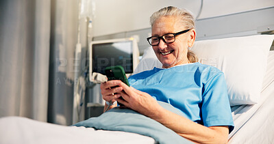 Buy stock photo Smartphone, patient and old woman in hospital bed, smile or message to contact, internet and app. Recovery, pensioner or elderly person in clinic, cellphone or social media with healthcare or healing