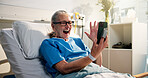 Senior woman, phone and video call in hospital bed with wave, surprise or get well soon message. Person, smartphone and virtual contact on social media with rehabilitation, hello or chat at clinic