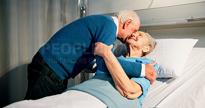 Buy stock photo Kiss, visit and senior woman in hospital with husband for bonding, support or care in recovery. Retirement, marriage and elderly patient in ward bed with empathy for connection in medical clinic.
