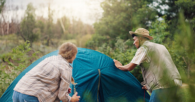 Buy stock photo Tent, help and couple with wilderness, camping and assistance with teamwork, nature and support. Outdoor, campsite or man with woman, preparation or countryside with vacation, talking or adventure