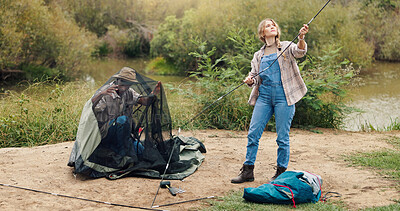 Buy stock photo Couple, pitching and tent for camping outdoor for travel gear, vacation adventure and bonding together. People, helping and setup equipment as nature shelter, campsite preparation and holiday getaway