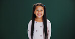 Happiness, portrait and girl child in studio with smile, education and learning on green background. Excited, young and female in school with mockup, space or holiday for summer in childhood.