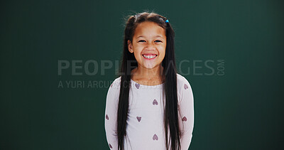 Buy stock photo Happiness, portrait and girl child in studio with smile, education and student on green background. Excited, young and female in school with mockup, space or learning for knowledge in childhood.