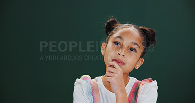 Buy stock photo Thinking, ideas and child in studio by mockup space with solution, choice or decision for memory. Dreaming, problem solving and girl kid with brainstorming or planning expression by green background