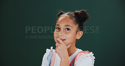 Buy stock photo Thinking, ideas and kid in studio with solution, choice or decision by mockup space with memory. Dreaming, problem solving and girl child with brainstorming or planning expression by green background