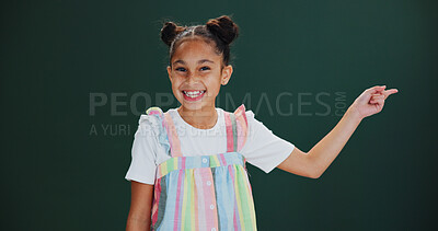 Buy stock photo Studio, portrait and child with news, pointing and happy for presentation, discount or mockup space. Green background, advertising and girl with positive attitude for offer alert, deal and promotion