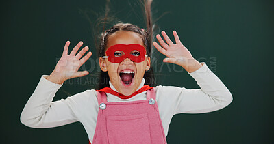 Buy stock photo Portrait, superhero and girl in studio, excited and screaming on green background. Happiness, mask and child with fantasy, scifi and comic with character, surprise and Halloween with games or cosplay
