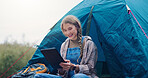 Smile, woman and laptop with tent outdoor for research, watching movies and weather forecast. Female person, reading and pc for camping vacation, browsing internet and online entertainment in nature