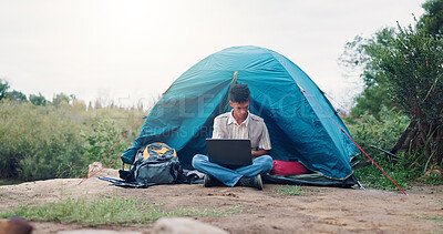 Buy stock photo Nature, camping and man with laptop, tent and travel writer on holiday, remote work or search on web. Online, author and person with tech for article, freelancer and vacation in forest and outdoor