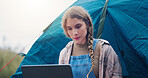 Woman, reading and laptop with tent outdoor for research, watching movies and weather forecast. Female person, pc and relax for camping vacation, browsing internet and online entertainment in nature