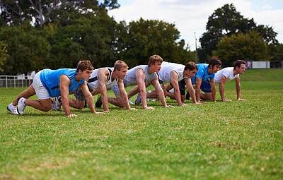 Buy stock photo Team, running and start of training in outdoors, sprint and practice on sports field for race. People, athletes and cardio challenge on grass for workout, performance and ready by starting line