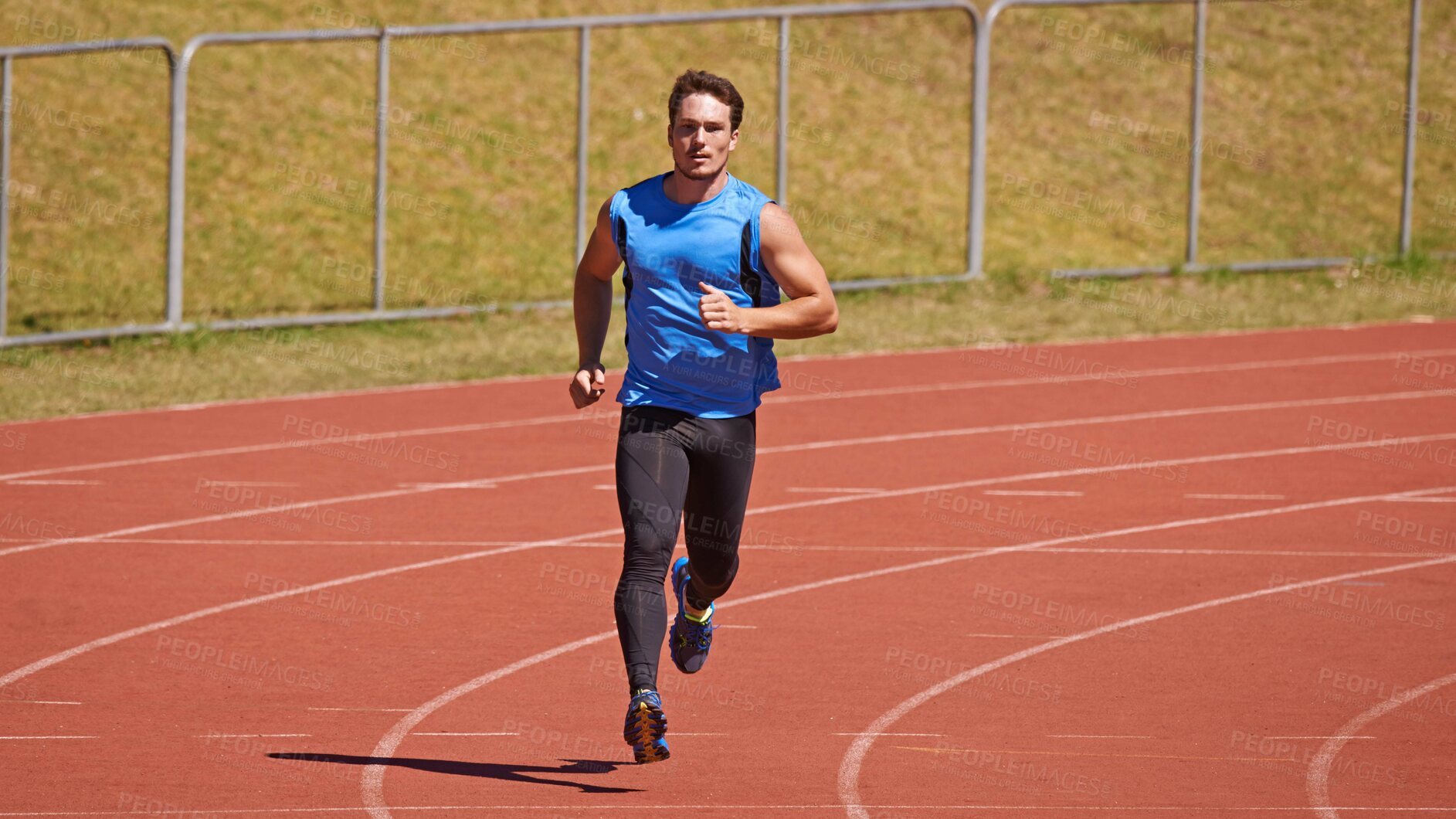 Buy stock photo Man, athlete and running on race track for sports, fitness and cardio with speed and action outdoor. Exercise, workout and training at stadium or arena, moving for health with fast runner or sprinter
