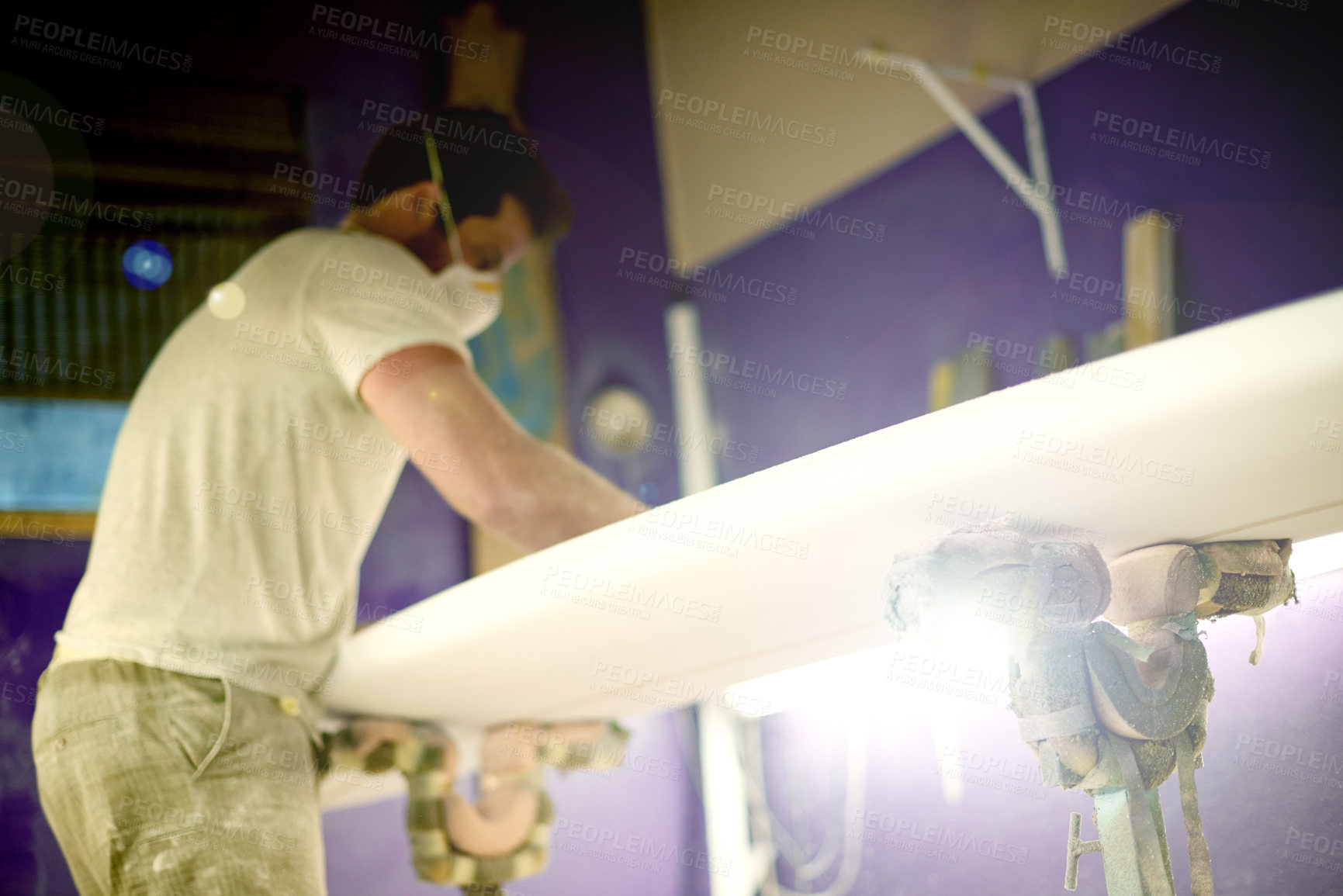 Buy stock photo Artisan, tools and person in workshop with surfboard, repair and working in industry. Production, startup and man in manufacturing with equipment, polish and smoothing for handmade surf product