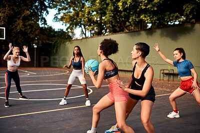 Buy stock photo Teamwork, basketball and women playing game together for competition, challenge and fitness on playground. Outdoor, performance and girl friends on court with ball, exercise and fun at sports club.