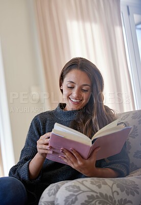 Buy stock photo Happy, young woman and reading book on sofa for story, novel or learning knowledge at home. Relax, female person and student with books for studying, literature and hobby in lounge or living room 