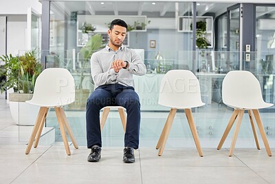 Buy stock photo Man, watch and time in queue for interview at startup with thinking in waiting room for meeting with HR. Person, clock and row for job opportunity, hiring or recruitment with ideas in lobby at office