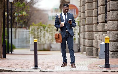 Buy stock photo Cell phone, walk and black man in city for work commute, social media and networking in town. Travel, professional and male worked in road with coffee, smartphone and internet for texting and email