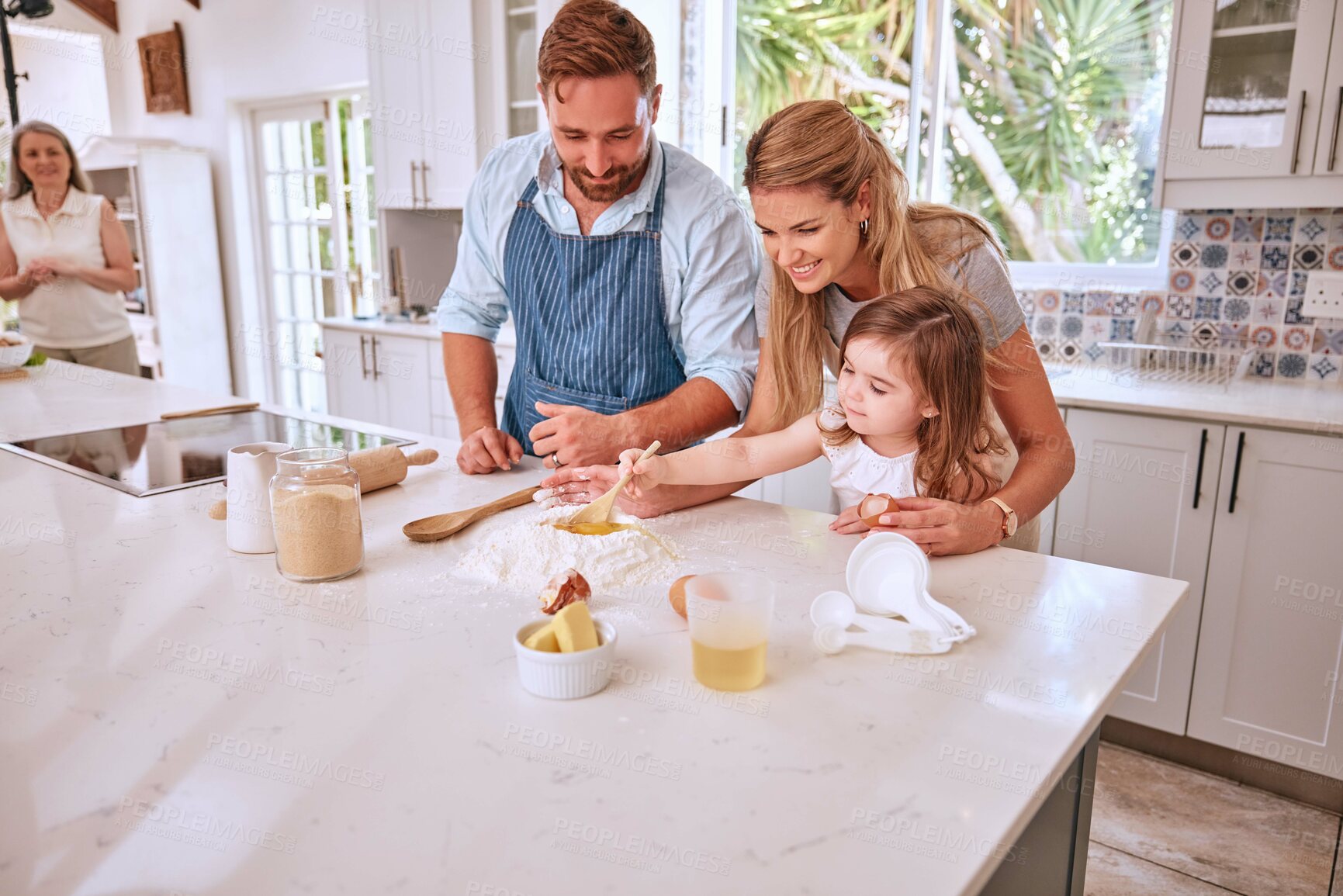 Buy stock photo Learning, family cooking and girl in kitchen with mom teaching child how to bake. Baking, education and happy parents enjoying time with kid, care or bonding and preparing food, egg and flour recipes