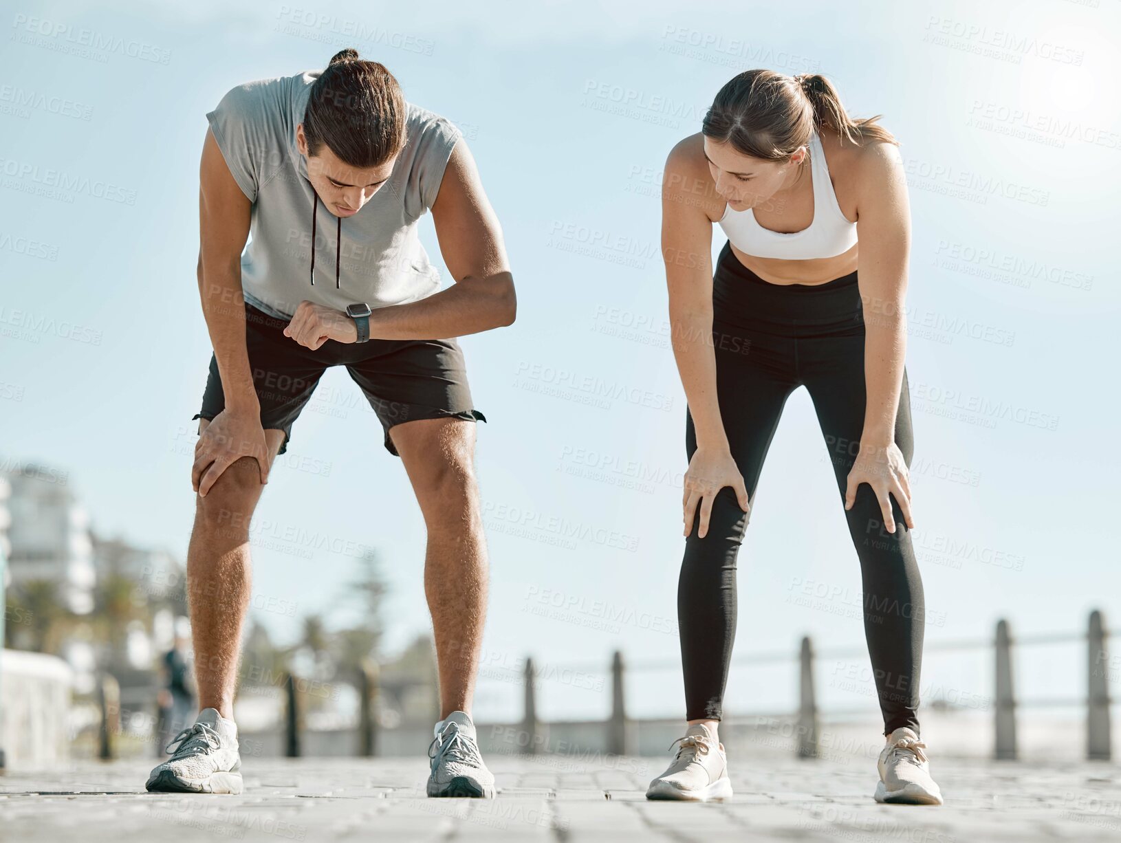 Buy stock photo Running, tired couple and watch for time, performance and goals on blue sky for wellness. Man and woman outdoor in nature for workout, fitness and exercise for healthy lifestyle and body fatigue